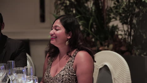 Young-Indian-woman-laughing-at-a-wedding-in-slow-motion