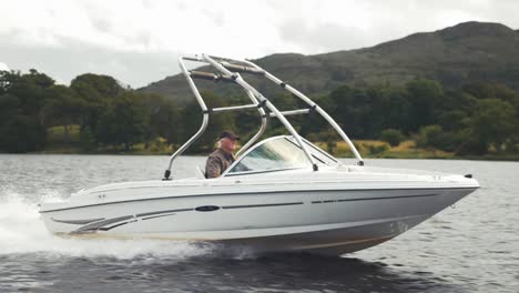 Speed-boat-tracking-shot-on-lake