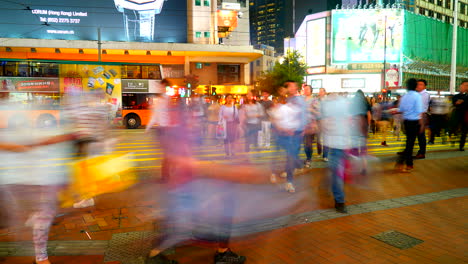 Hong-kong---Circa-Time-lapse-of-busy-people-walk-on-the-pedestrian-crosswalk-at-traffic-road-with-the-signage-on-the-Hong-Kong-city-road