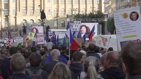 Crowd-of-people-with-banners-and-flags-during-demonstration-against-Andrej-Babis-and-Milos-Zeman,-Prague,-Czech-Republic,-closeup-shot