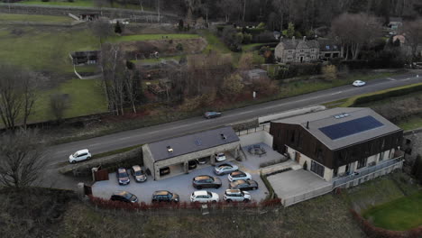 Countryside-Mansion-with-Many-Fancy-Cars-Outside