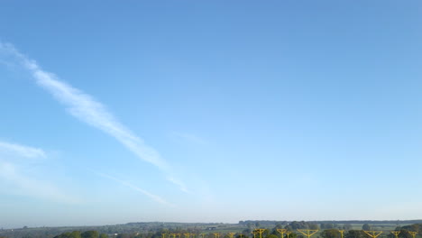 Tilting-Down-Shot-Revealing-Approach-Lighting-System-at-Leeds-Bradford-International-Airport-in-Yorkshire,-England-on-Sunny-Summer’s-Morning