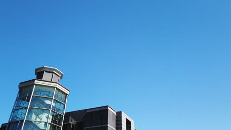 Shot-of-Leeds-Dock-Mixed-Development-in-Yorkshire,-UK-on-a-Sunny-Summer’s-Day-Fading-Out-Diagonally-Left-to-Blue-Sky