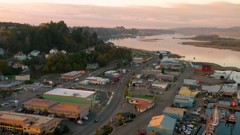 Aerial-of-boats-and-warehouses-in-Coos-Bay,-Oregon,-drone-footage-4k