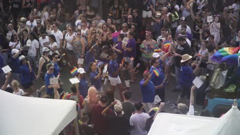 People-Marching-in-Street-at-River-City-Pride-Parade-in-Jacksonville,-FL