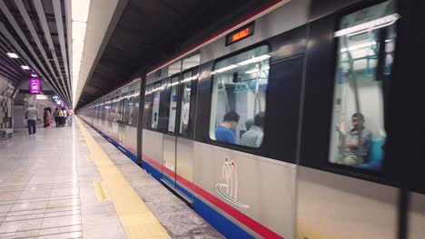 Marmaray-metro-goes-in-tunnel-with-people-inside-to-Europian-side-in-Istanbul,Turkey