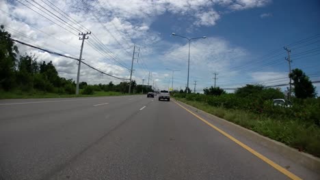 This-is-a-time-lapse-with-an-action-camera-mounted-in-front-of-the-truck,-driving-from-Pranburi-to-Hua-Hin-and-Hua-Hin-to-Bangkok-on-Phet-Kasem-Road