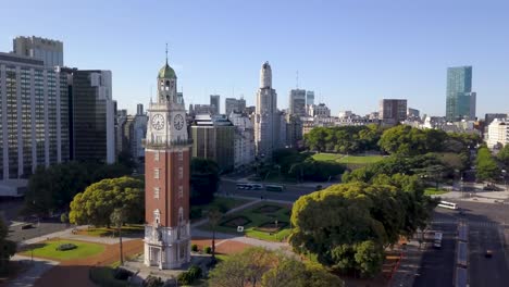Aerial-view-of-Torre-Monumental-with-Kavanagh-art-deco-building-in-background,-Buenos-Aires