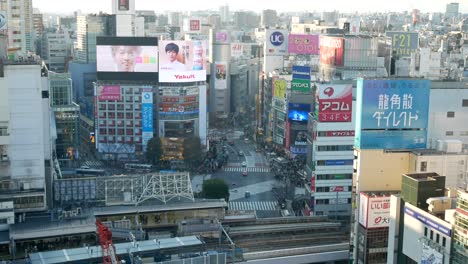 Shibuya-Crossing,-Tokyo,-Japan-:POV-above-at-Shibuya-crossing