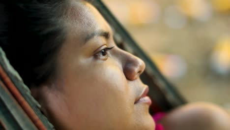 A-young-woman-in-a-hammock-at-the-Parque-das-Tribos-community-for-indigenous-people