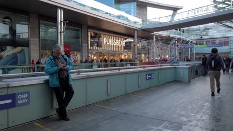 Public-Christmas-shopping-people-walking-urban-Liverpool-city-wearing-corona-virus-masks