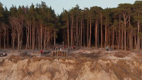 AERIAL:-The-Dutchman's-Cap-On-Golden-Hour-with-People-Enjoying-Evening-and-Forest-Trail-in-Background