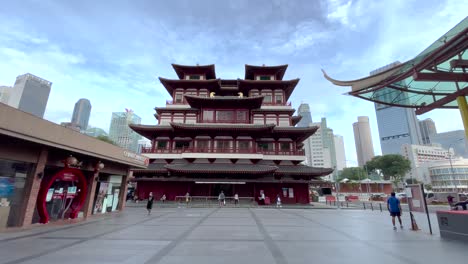 People-walking-at-public-square-by-Buddha-Tooth-Relic-Temple,-Singapore