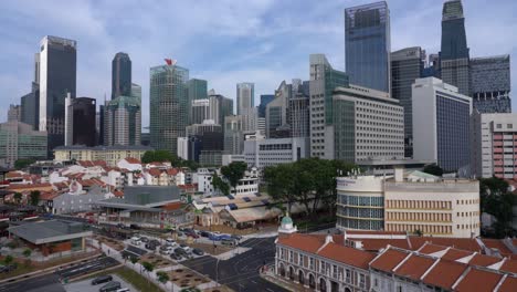 Shophouses-En-Chinatown-Contra-El-Moderno-Horizonte-De-Singapur-Desde-El-Distrito-Central-De-Negocios