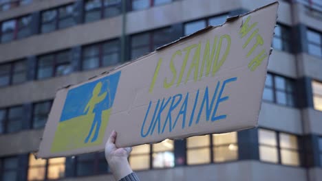 I-Stand-With-Ukraine-Message-on-Board-in-Hand-of-Protestor-on-Demonstration-Against-War-and-Russian-Military-Actions-and-Invasion