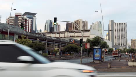 A-bus-drives-through-an-intersection-in-Panama-City,-Central-America