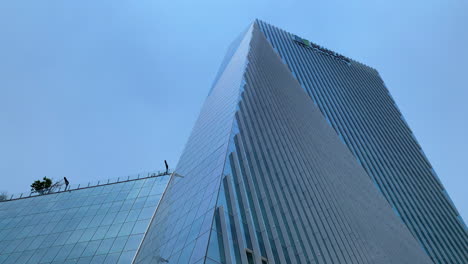 Looking-Up-At-Torre-Manacar-Building-Against-Clear-Blue-Skies-In-Mexico-City