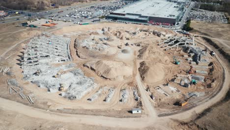 AERIAL:-Heavy-Machinery-Runs-Through-A-Rubble-of-National-Stadium-in-Vilnius