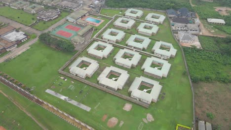 Ogere-Resort,-Ogun-State,-Nigeria--15-September-2021:-Aerial-view-of-the-green-area-in-a-resort-featuring-the-lawn,-garden-and-blocks-of-structures