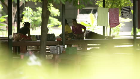 three-burmese-woman-sitting-outdoor