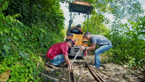 Swiss-Captain-Operating-old-fashioned-train-in-La-Fortuna---Costa-Rica