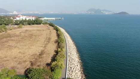 Disneyland-Hotel-and-park-in-Hong-Kong-empty-and-closed-for-visitors-due-to-covid19-lockdown-guidelines,-Aerial-view