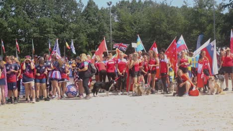 Participants-From-Different-Countries-With-Their-Pet-Dogs-At-European-Open-Juniors-Championship---Agility-Competition-In-Netherlands---panning-shot