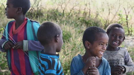 Ziway-kids-pose-for-camera-outdoors-while-laughing-and-having-fun