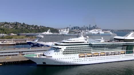 Aerial-drone-video-of-Seattle-Bremerton-ferry-dock,-near-downtown-Seattle,-King-County