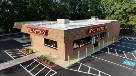 Aerial-establishing-shot,-Wells-Fargo-retail-bank-branch,-American-financial-institution-in-USA,-financial-oversight-fine,-entrance-for-cash-check-deposit