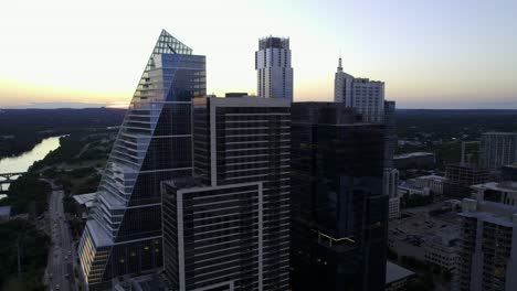 Aerial-view-around-the-Google-complex,-in-Austin,-USA,-during-summer-dusk---circling,-drone-shot