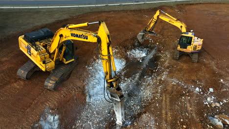 Komatsu-jackhammer-equipment-breaks,-blasts,-digs-rock