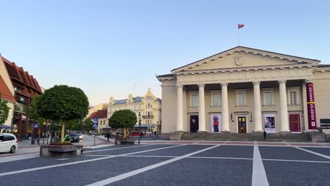 Town-hall-square-with-Lithuanian-flag-waving-and-St