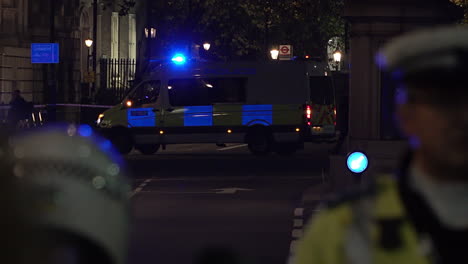 UK-November-2018---Metropolitan-police-officers-guard-a-security-cordon-during-the-investigation-of-a-suspect-package-near-Downing-Street-on-Whitehall-in-London