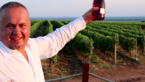 Man-Popping-Wine-Bottle-Head-with-Popping-Sword-at-Vineyard