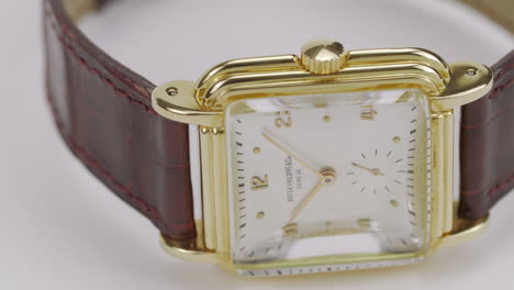 Vintage-luxury-watch,-Patek-Philippe,-very-rare-fine-18k-pink-gold-stepped-square-time-piece