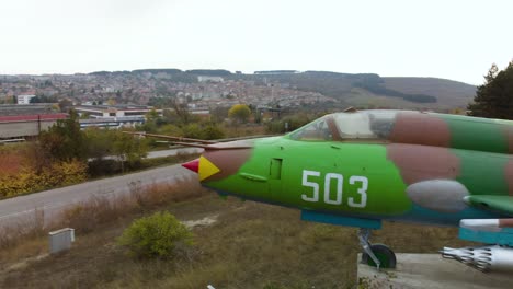 Aerial-close-shot-around-airplane-fighter-nose