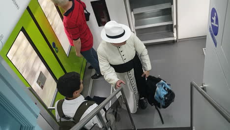 Florence,-Italy---circa-July-2019---Senior-priest-travelling-on-a-local-train-for-pelegrinage