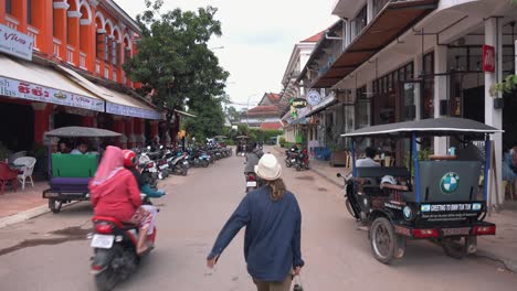 Female-Tourist-Crossing-a-Junction-Near-Pub-Street