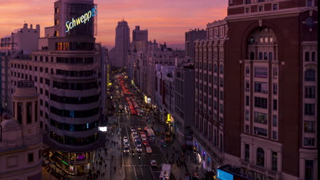 Timelapse-of-Gran-Vïa-street-at-sunset,-Madrid