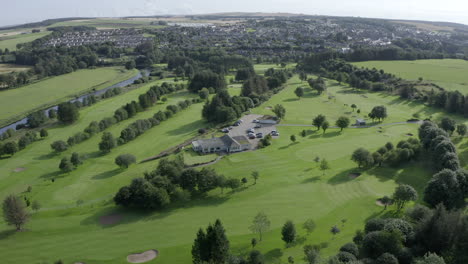 An-aerial-view-of-Turriff-Golf-Club,-Aberdeenshire,-on-a-sunny-morning