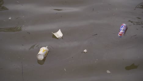 BRISTOL,-SOMERSET,-UNITED-KINGDOM,-Mc-Donalds-trash-that-have-been-dumped-in-the-Avon-river-Bristol