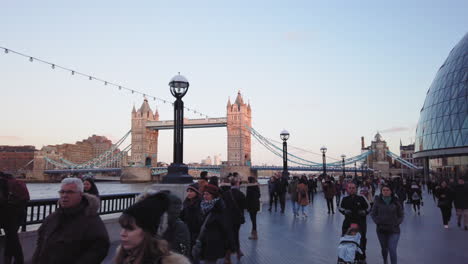 Panning-view-from-right,-City-Hall-office-to-the-Mayor-and-London-Assembly,-to-left,-iconic-and-famous-Tower-Bridge-landmark