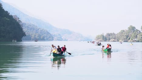 People-finishing-the-boat-race-making-an-achievement-during-a-boat-racing-event