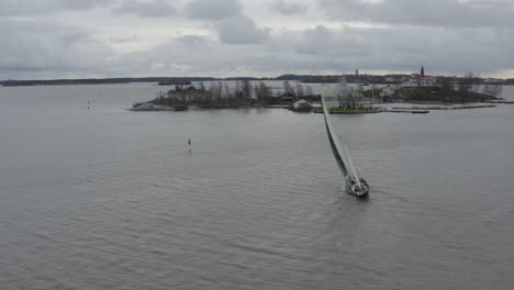 Drone-footage-of-boat-sailing-between-islands