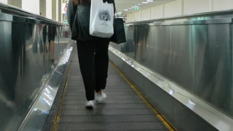 Passenger-on-escalator-in-the-terminal-of-Donmuang-inbternation-airport