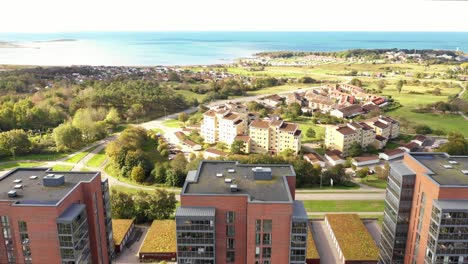 Aerial-view-of-three-high-rises-by-the-ocean