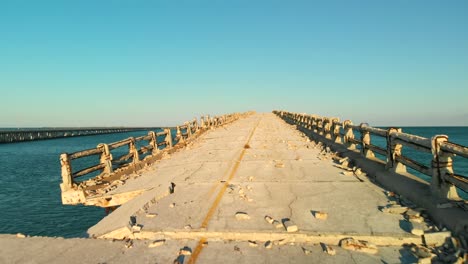 Post-apocalyptic-look-and-feel-through-aerial-of-old-over-the-water-road-in-the-Key-islands