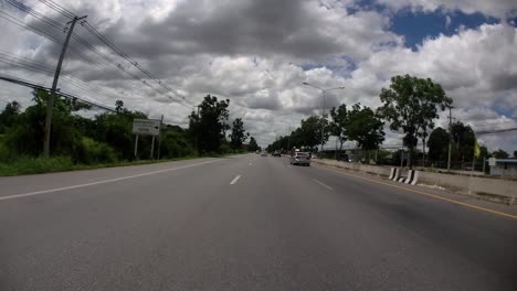 This-is-a-time-lapse-with-an-action-camera-mounted-in-front-of-the-truck,-driving-from-Pranburi-to-Hua-Hin-and-Hua-Hin-to-Bangkok-on-Phet-Kasem-Road