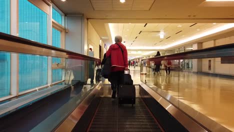 Following-a-passenger-walking-through-Hong-Kong-International-Airport